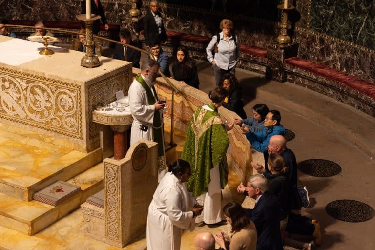 Trinity_0924-016_Gathering around the altar for Eucharist