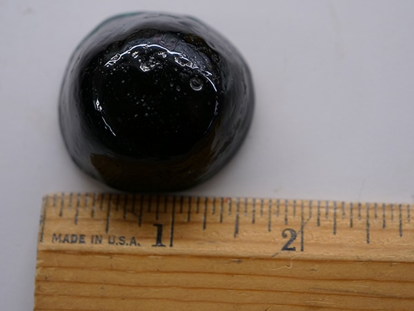 Each cabochon is about 1.5 inches in diameter and weighs a few ounces.